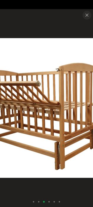 Дитяче ліжечко-маятник