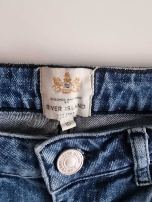 Spodnie z dziurami River Island 38(M)