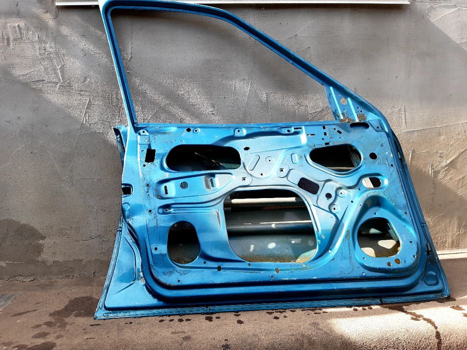 Продам дверь,опель астра ,седан,93г.