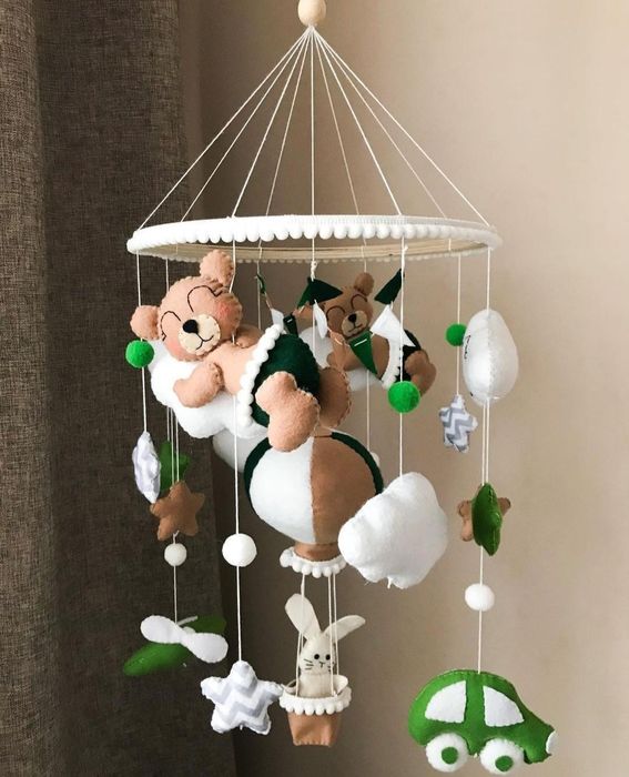 Дитячий мобіль у ліжечко з музичним блоком