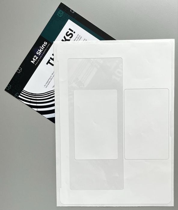 Białe ochronne naklejki winylowe do MacBook Air 2023 16’ + akcesoria