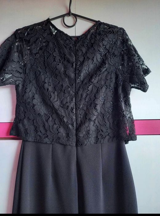 Elegancki czarny kombinezon 36