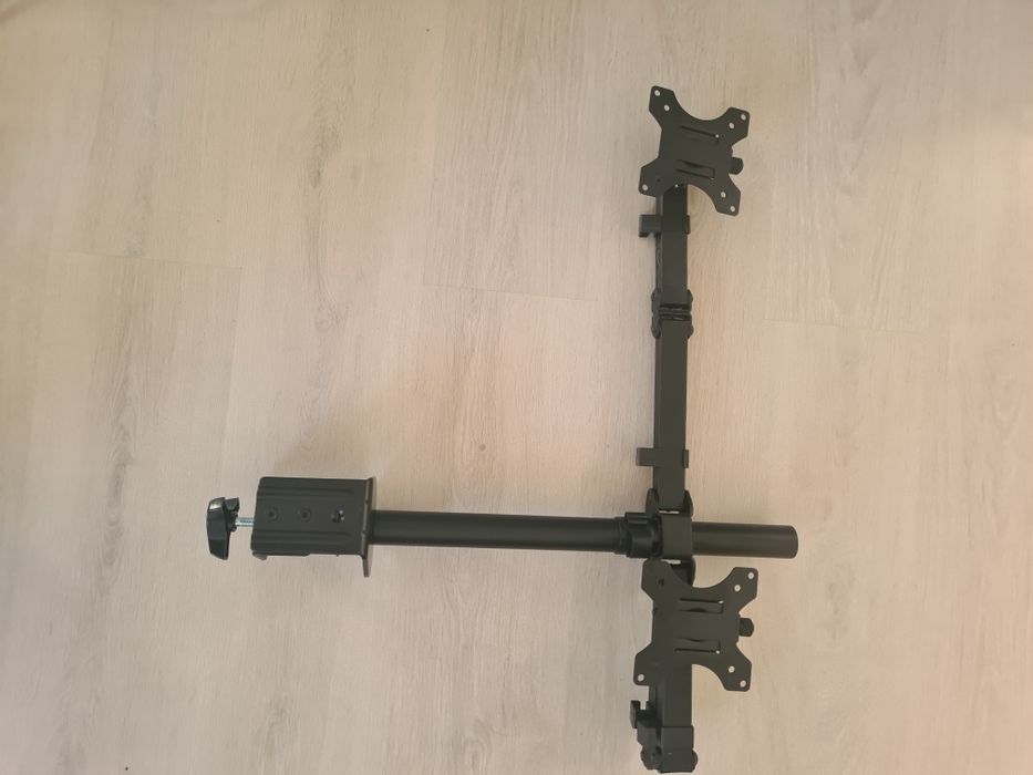 Sprzedam uchwyt na dwa monitory do 27 cali.