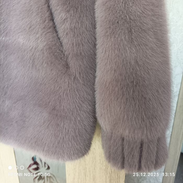 Продам  гарну нову шубку колір бузок  р.54