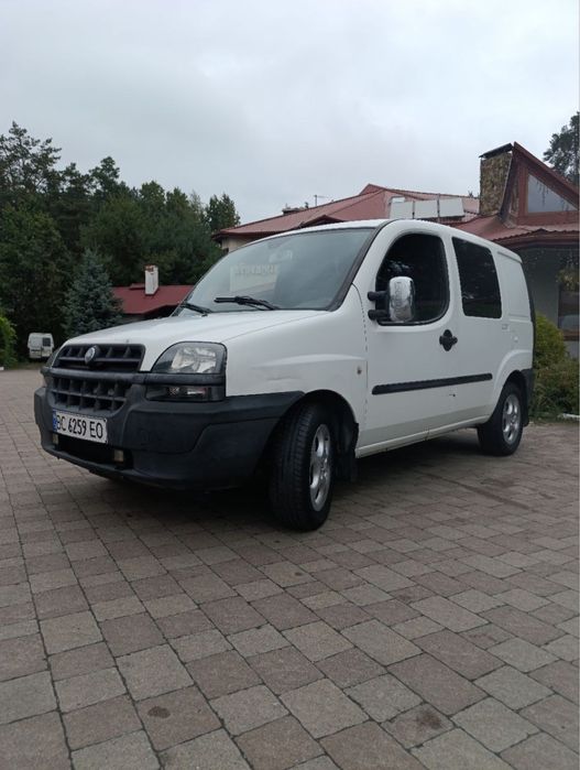 Машина Fiat Doblo