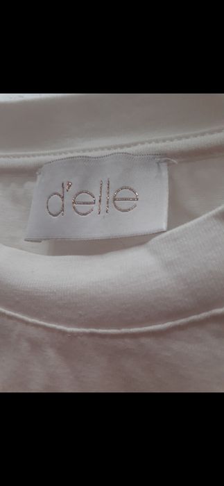 Blusa branca com mangas em tule. Elegante