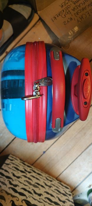 Walizka plastikowa na kułkach dziecięca