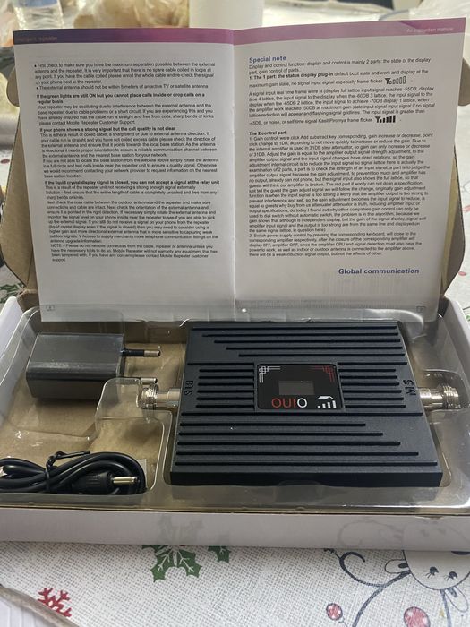 amplificador ou repetidor de sinal de rede móvel (telemóvel) da marca OUIO, especificamente o modelo SS73-DCS