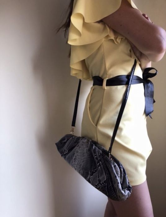 Anéis de senhora em prata e mala