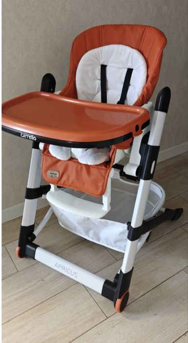 Продам стульчик для кормления Carrello Apricus (цвет Pale Terracota / терракотовый-оранжевый).