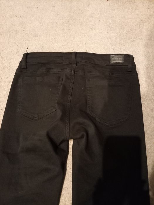 Jeansy skinny 3/4 dziury elastyczne czarne rurki 36