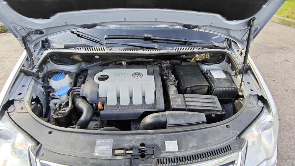 Фольксваген тоуран.