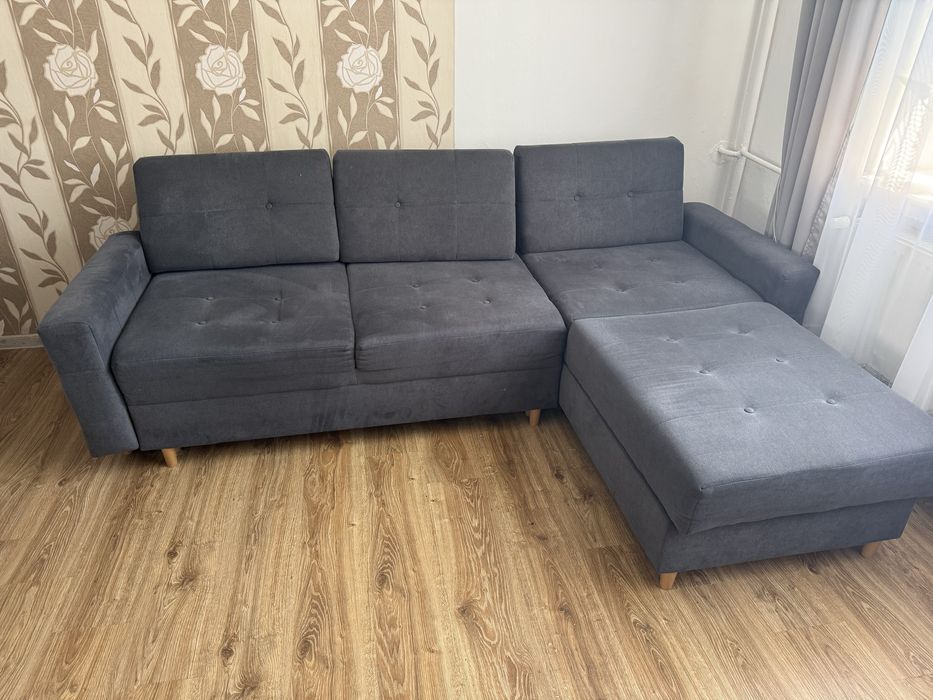 Kanapa/sofa rozkladana z funkcja spania i pojemnikiem na posciel
