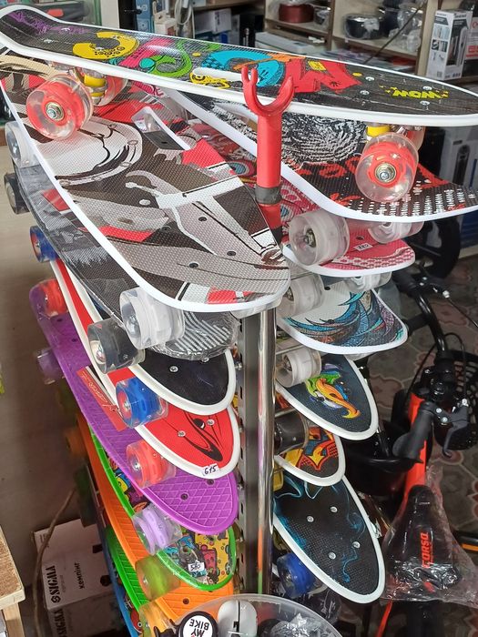 Пеніборди , скейти, шоломи