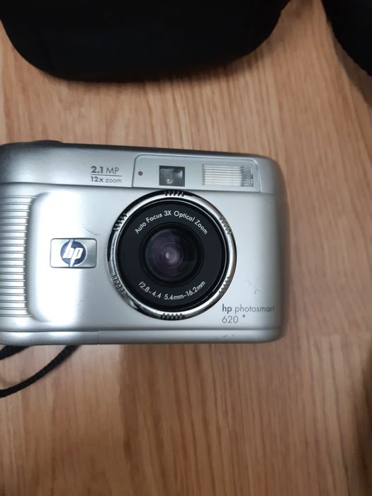 Máquina fotográfica HP + impressora de fotos HP + mala + utensílios.