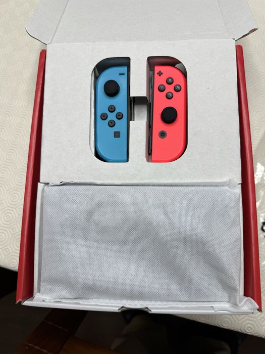 Nintendo Switch Oled com acessorios