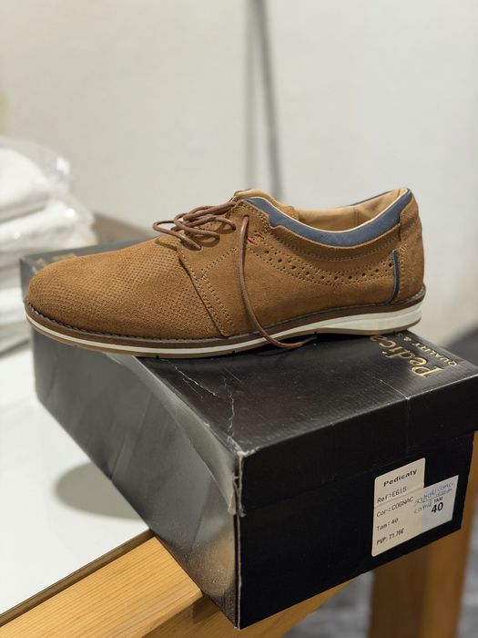 Sapato homem em pele