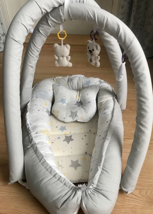 Дитячий кокон для новонародженого