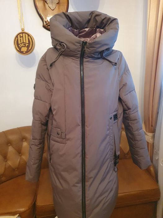 Продам пуховик в гарному стані,майж нов 54 р шир 118 -120см довж90см