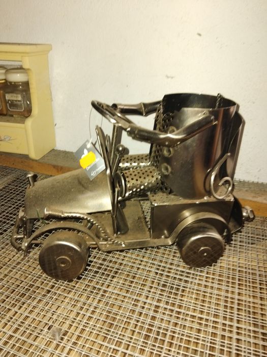 Porta garrafas em latão