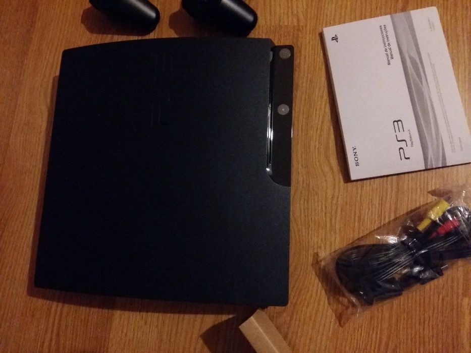 120GB PS3 Slim with Two Controllers and Three Games64584213147777121