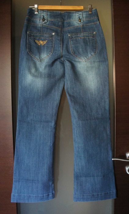 damskie spodnie dżinsy dzwony wysoki stan 40 L jeans flare za 1/2 ceny