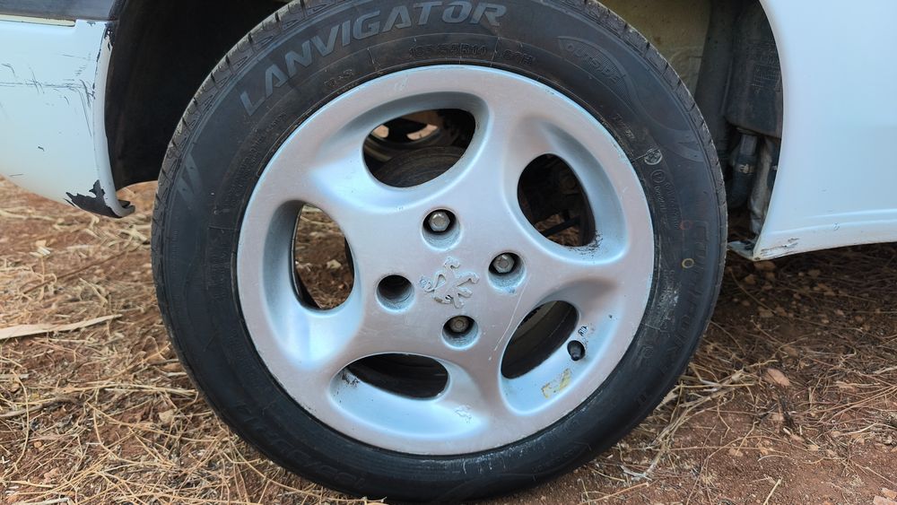4 jantes Peugeot 106 GTI c/pneus