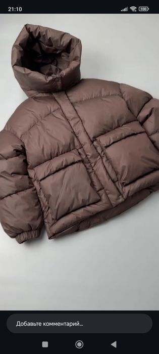 Жіночий пуховик з об'ємними кишенями