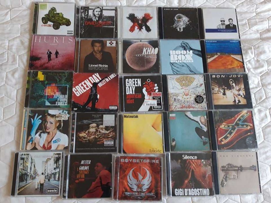 Płyty CD- Gigi D'Agostino, Moby, Foo Fighters, Green Day, Bon Jovi