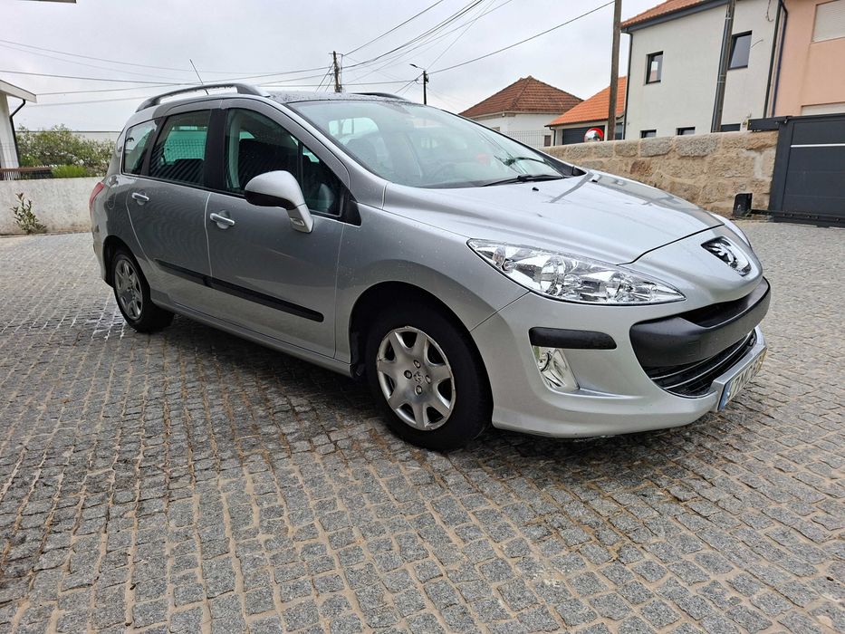 Peugeot 308 SW 7 lugares teto panorámico