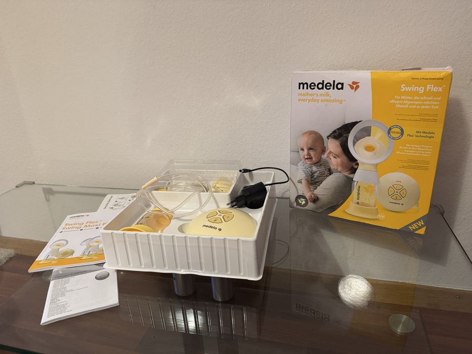 Електричний молоковідсмоктувач MEDELA Swing Flex молокоотсос помпа