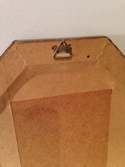 Espelho biselado com moldura em madeira