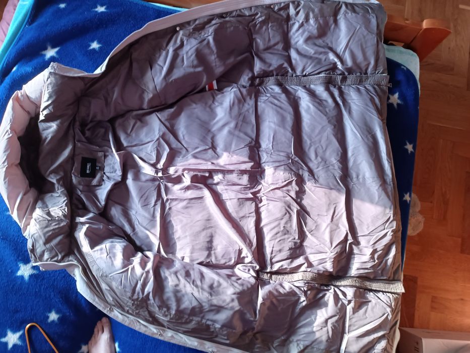 Продам пуховик женский новый