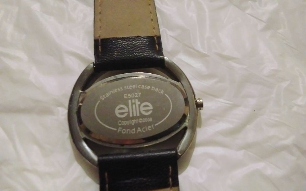 Часы   кварцевые.  . ELITE    и  ..  IK .