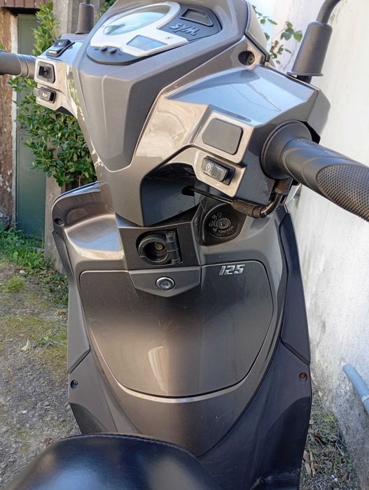 Moto 125 bem estimada troco por carro Ismart do mesmo valor..