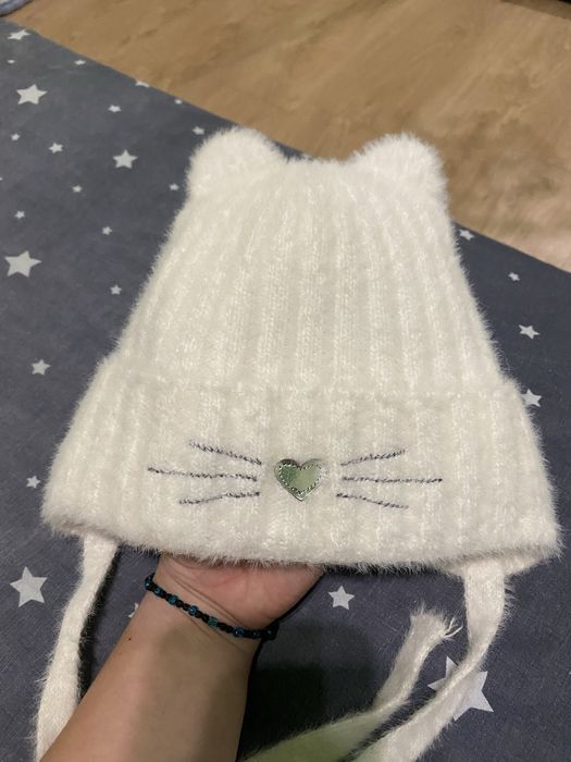Зимова шапка на дівчинку