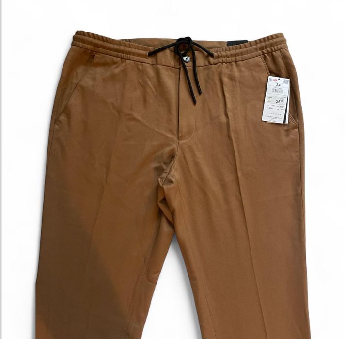 Штани чоловічі 34р. Світло-коричневого кольору літні  Нові