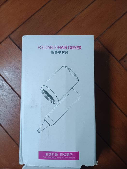 Secador com duporte de parede novo na caixa