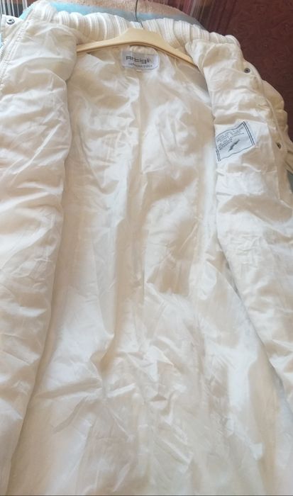 Женский пуховик .