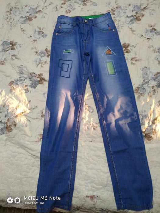 Джинсы модные