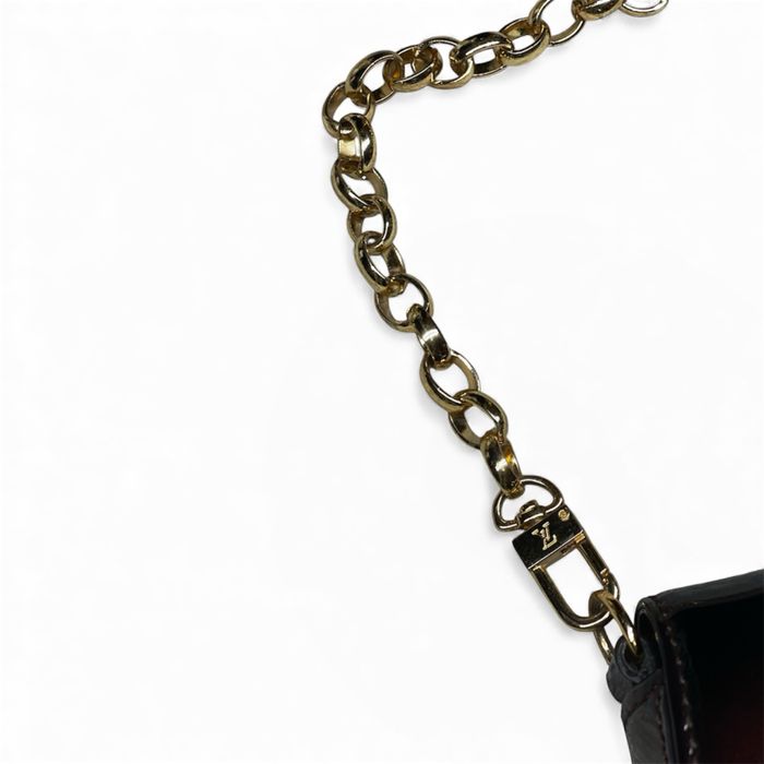 Женская сумка Louis Vuitton Amarante Patent SoBe clutch bag оригинал