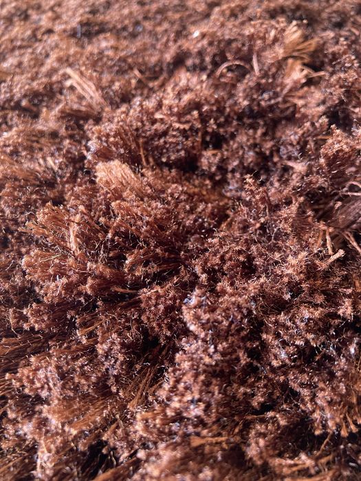 Tapete castanho de pelos