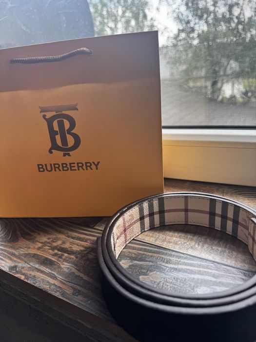 Czarny pasek burberry z paragonem