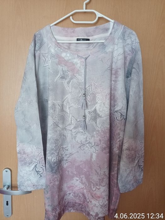 Sprzedam długą bluze rom 50