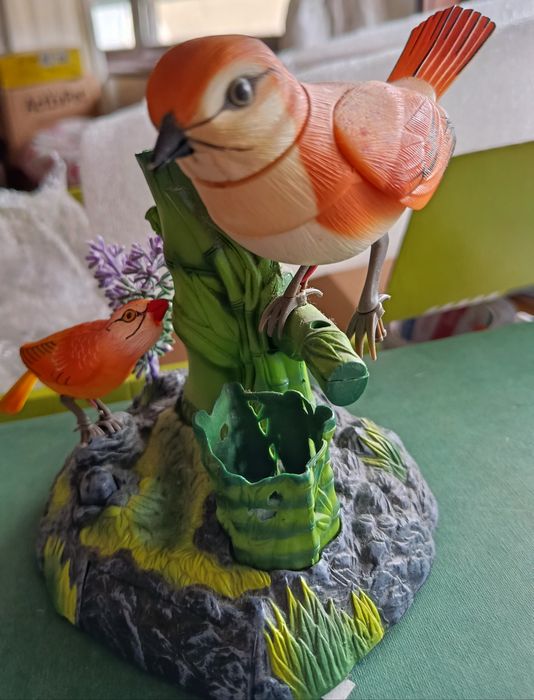 Peça decorativa com pássaros