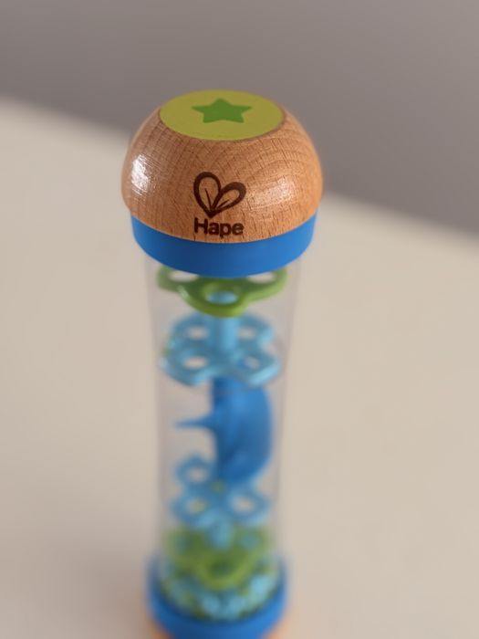 Brinquedo sonoro sensorial (som de chuva) Hape
