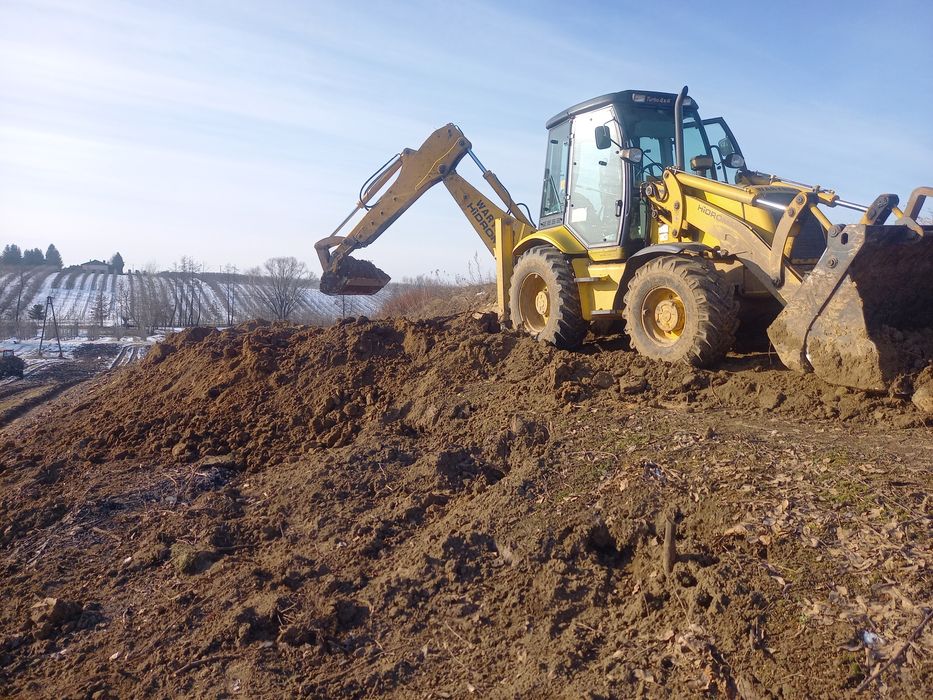 Wyrywanie sadów. Usługi koparko-ładowarką