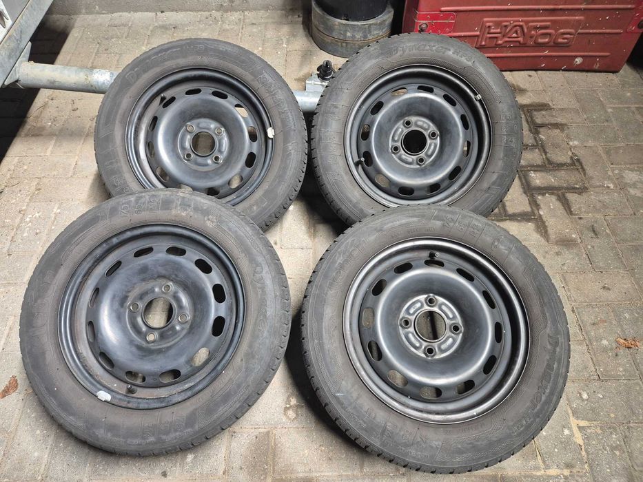 Felgi z oponami i kołpakami 14 cali 4x108 Ford