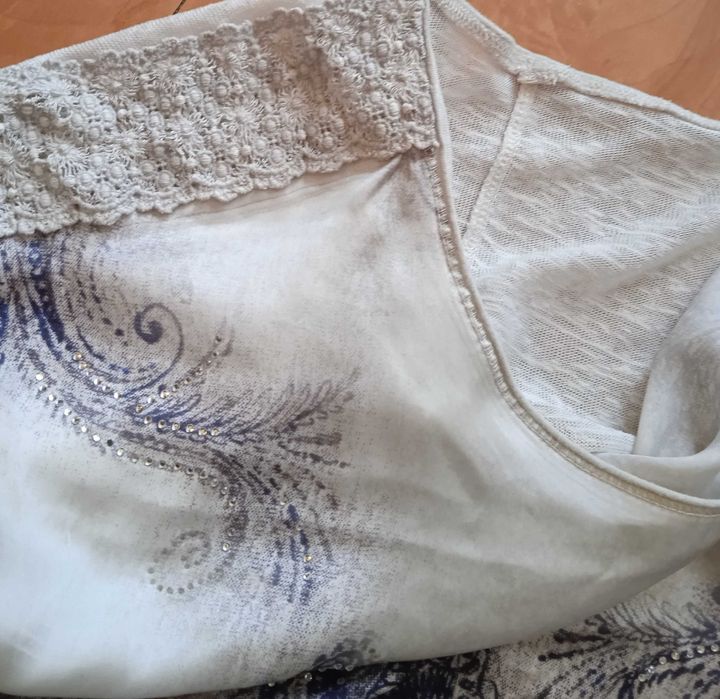 Elegancka bluzka z dłuższym tyłem rozmiar L