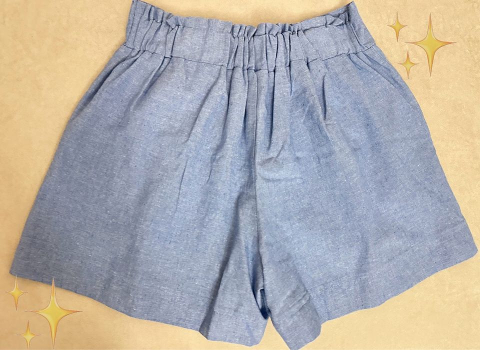 Блакитний льняний костюм